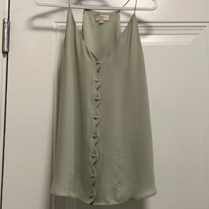 Sage green shirt from the loft. Small pull on bottom left.